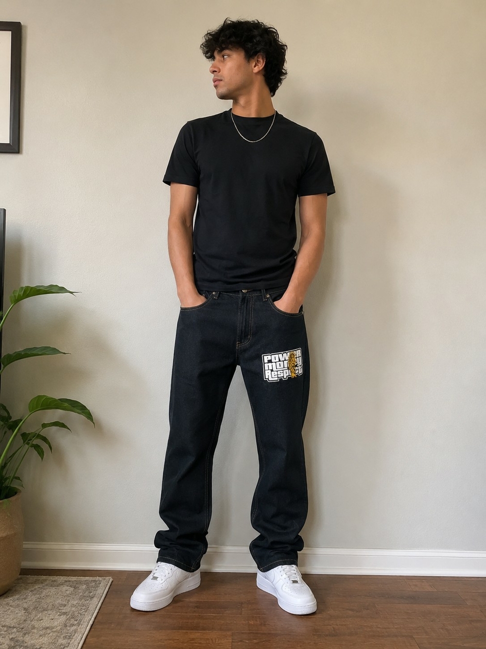 Relaxed Black Men's Jeans with Yellow Graphic Patch